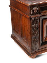 An Italian Carved Oak and Walnut Cassone