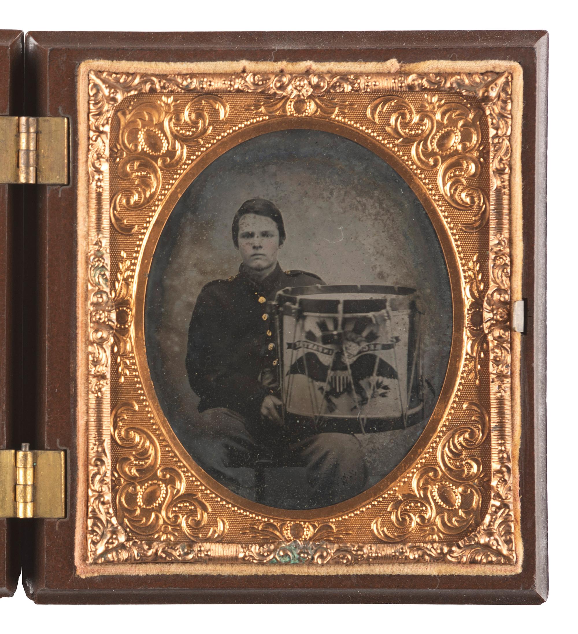 [CIVIL WAR]. Sixth plate ruby ambrotype of a musician with painted drum.