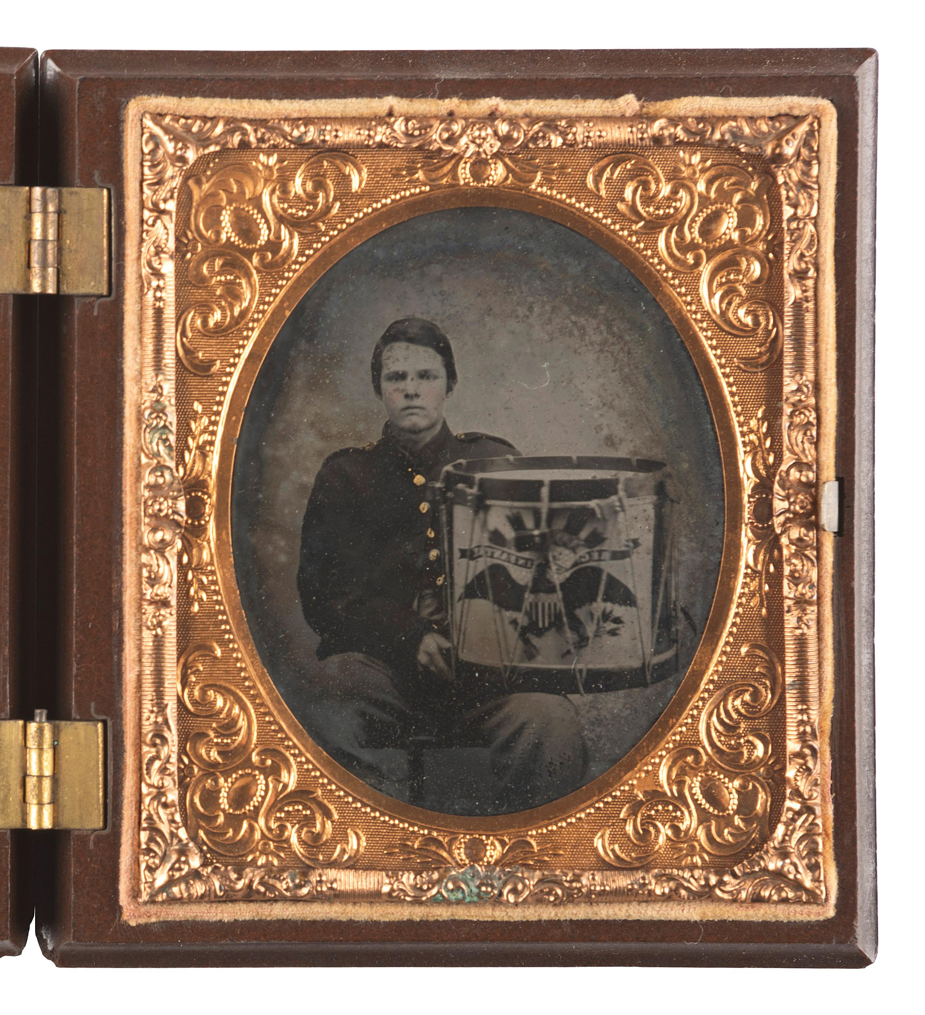 [CIVIL WAR]. Sixth plate ruby ambrotype of a musician with painted drum.