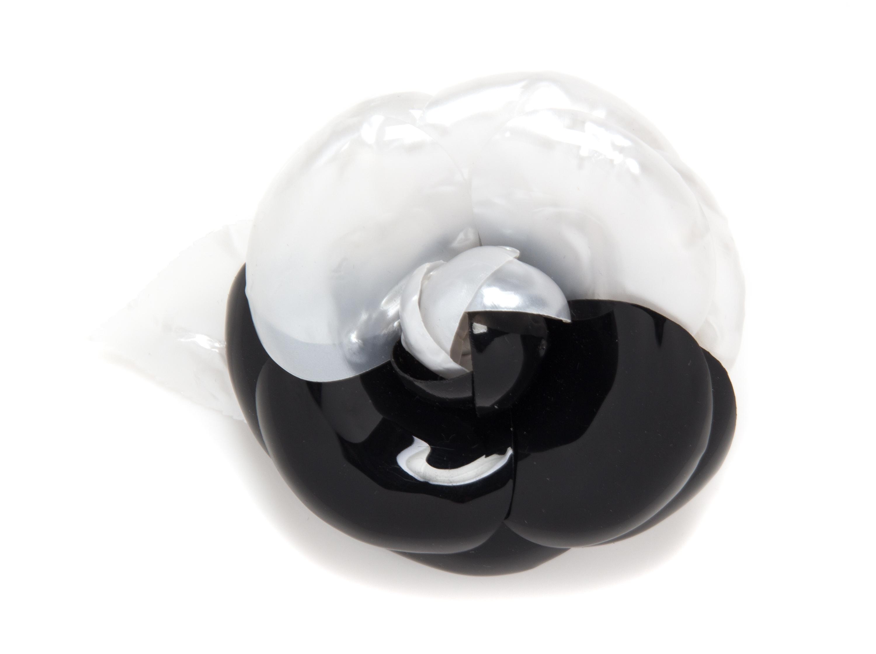 A Chanel Black and White Resin Brooch, 5" x 4".
