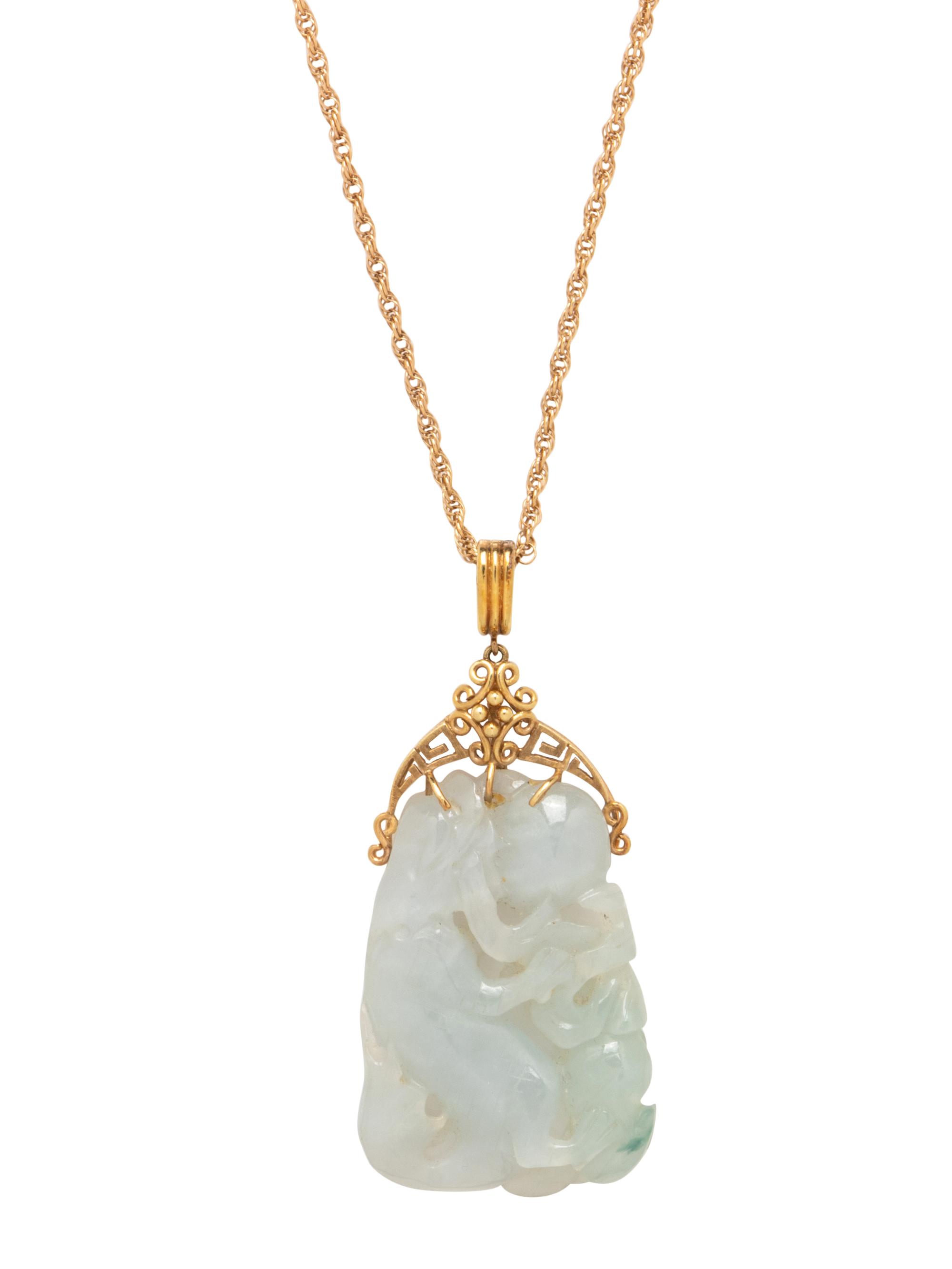 YELLOW GOLD AND CARVED JADE PENDANT/NECKLACE