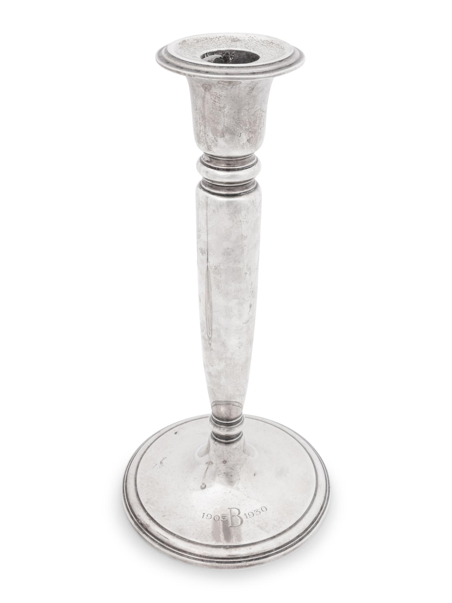 A Pair of Tiffany and Co Silver Candlesticks