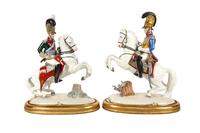 A Pair of Nymphenberg Porcelain Military Figures on Horseback Height 13 1/2 inches. — 20TH CENTURY