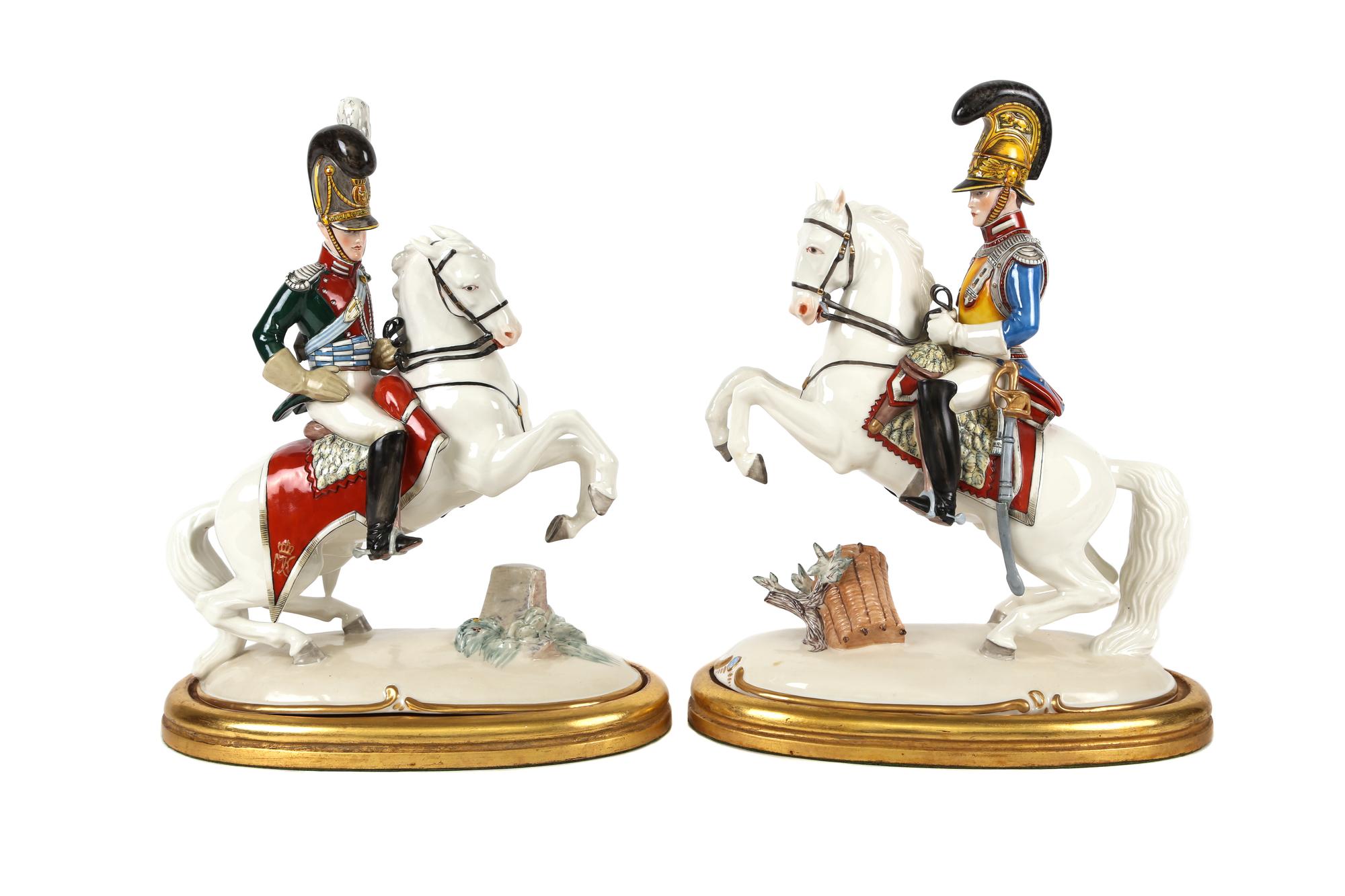 A Pair of Nymphenberg Porcelain Military Figures on Horseback Height 13 1/2 inches. — 20TH CENTURY