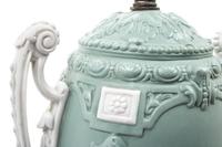 A Continental Bisque Porcelain Urn Mounted as a Lamp