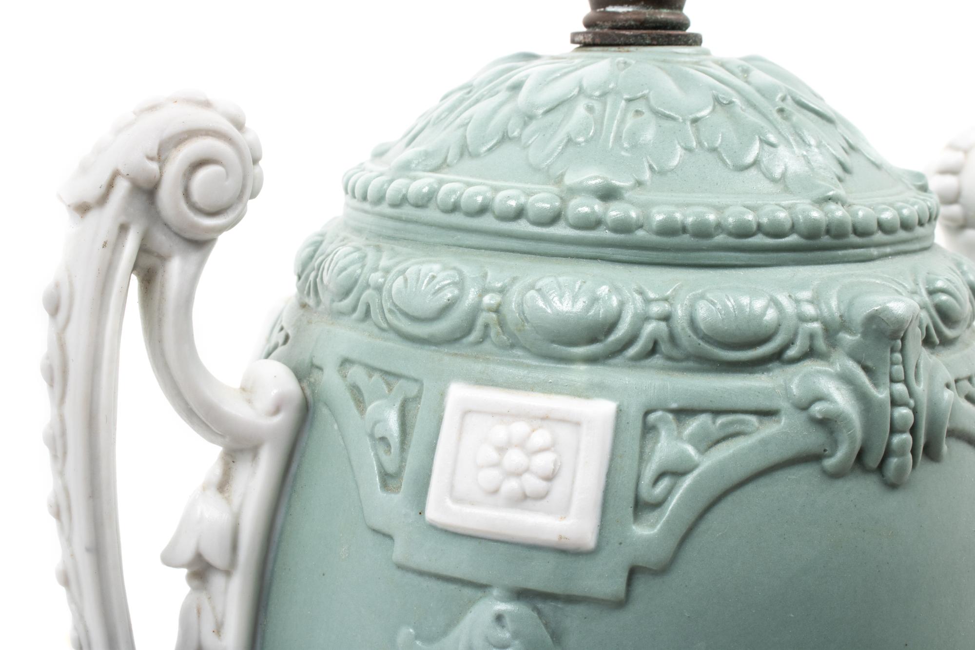 A Continental Bisque Porcelain Urn Mounted as a Lamp