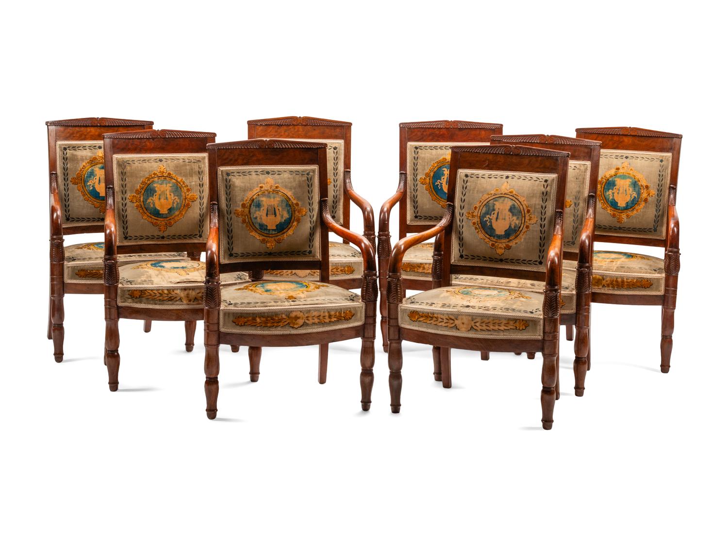 A Set of Eight Louis Philippe Carved Mahogany Armchairs