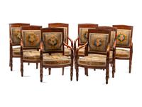 A Set of Eight Louis Philippe Carved Mahogany Armchairs