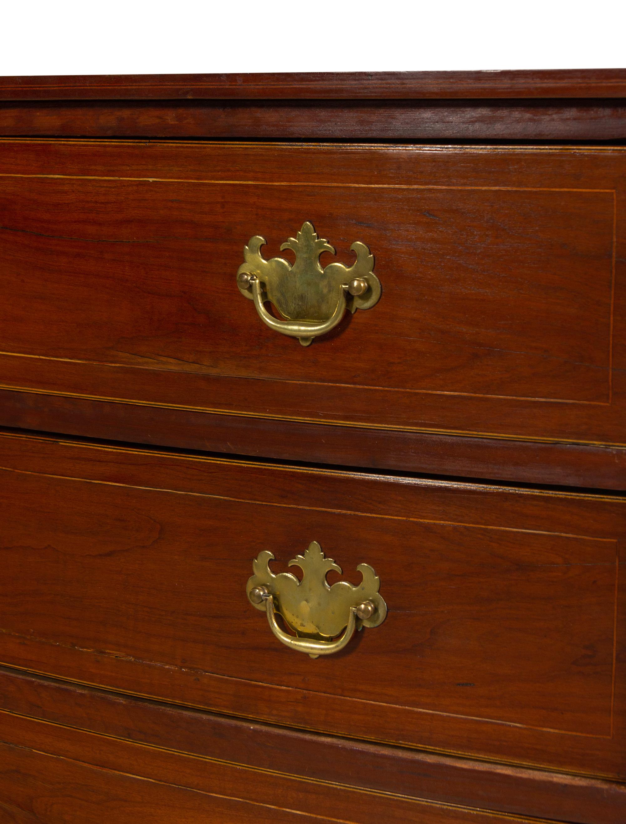 A Chippendale Cherry and Mahogany Chest of Drawers