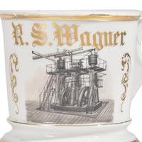 A Gilt and Enamel-Decorated Porcelain Occupational Shaving Mug Depicting the Corliss Steam Engine at Philadelphia Centennial Exposition