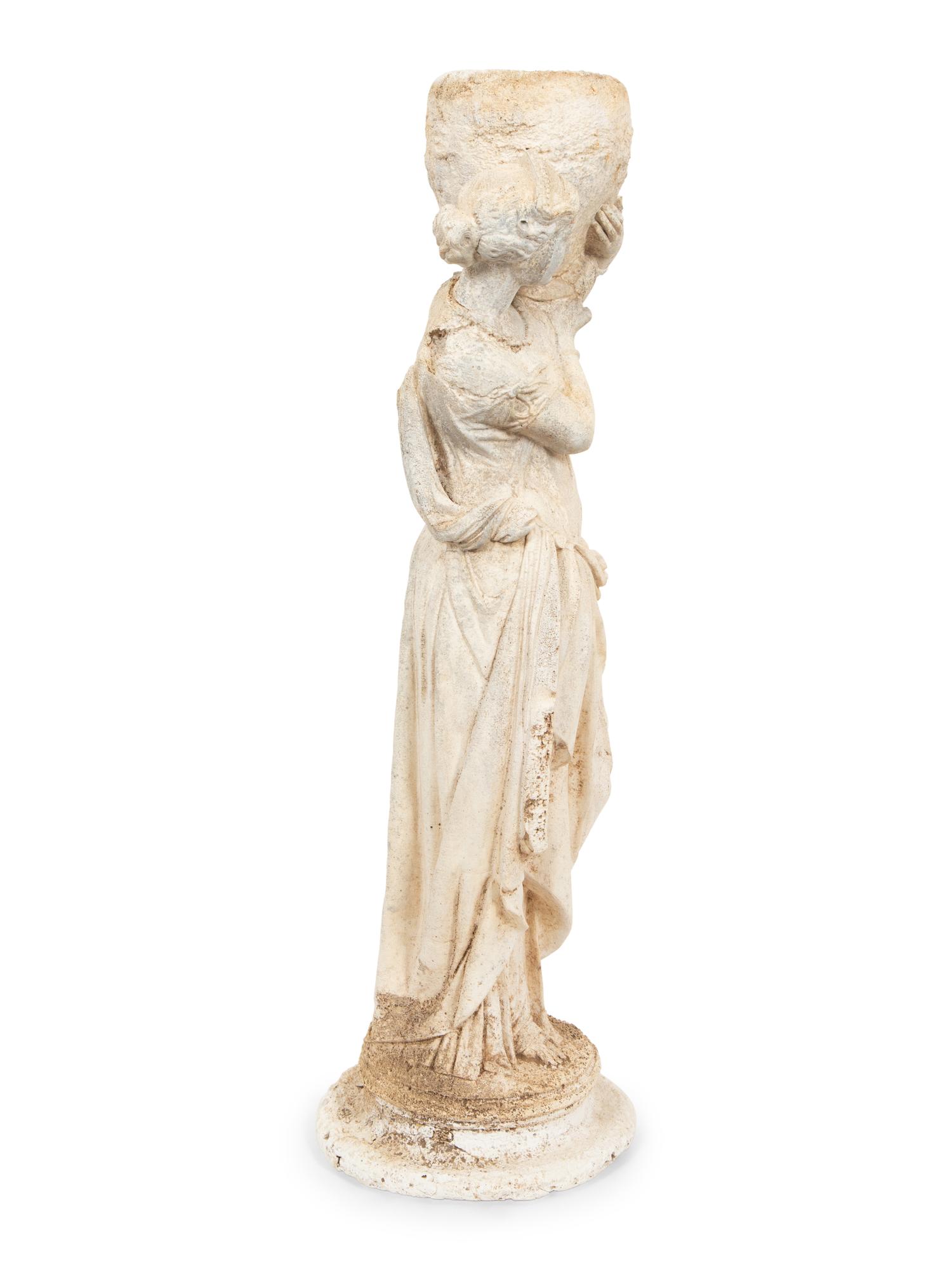 A Cast Composition Figure of a Water Maiden