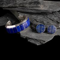 Michael L. Slim AND Knifewing Segura (Diné, act. since 1980s) AND (Chiricahua Apache, 20th century) — Sterling Silver and Lapis Cuff Bracelet and Post Earrings