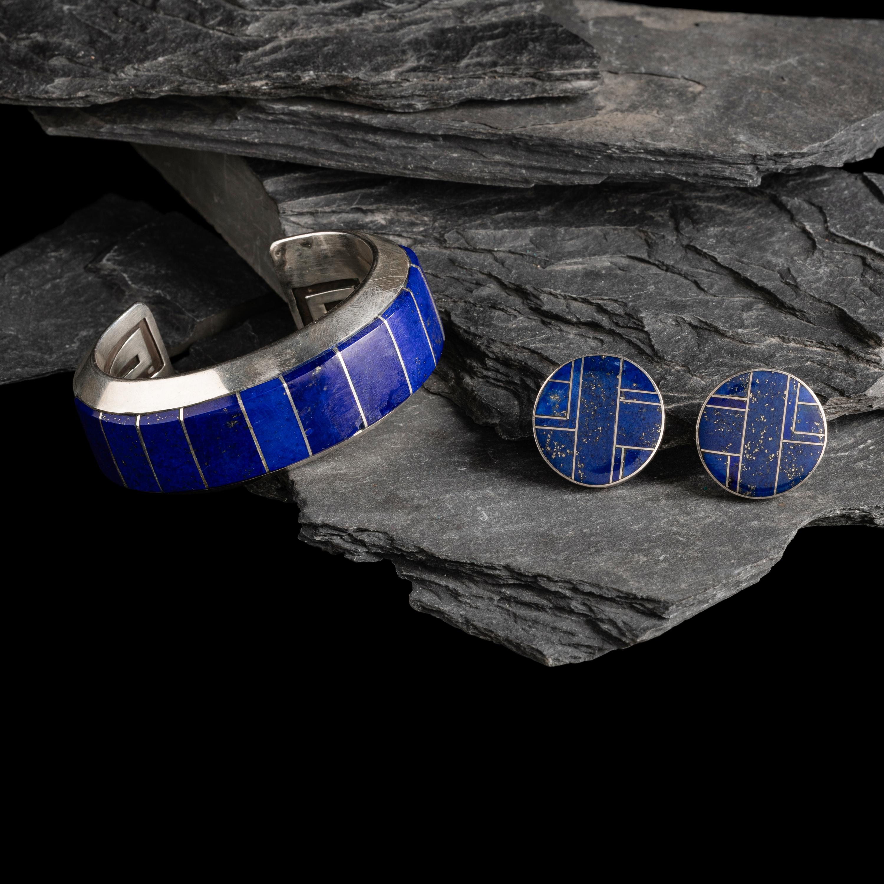 Michael L. Slim AND Knifewing Segura (Diné, act. since 1980s) AND (Chiricahua Apache, 20th century) — Sterling Silver and Lapis Cuff Bracelet and Post Earrings