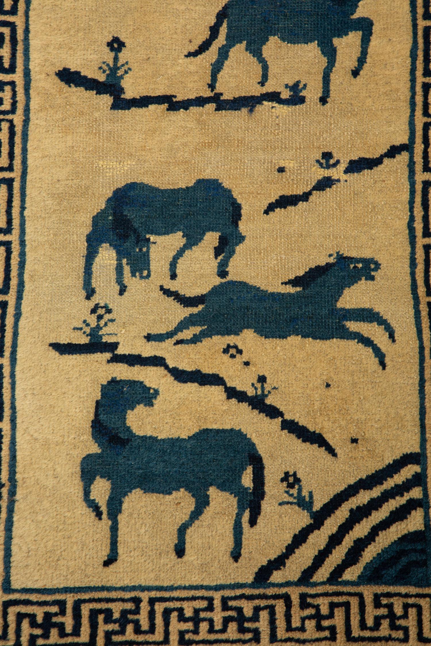 A Group of Three Chinese Rugs