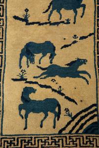 A Group of Three Chinese Rugs
