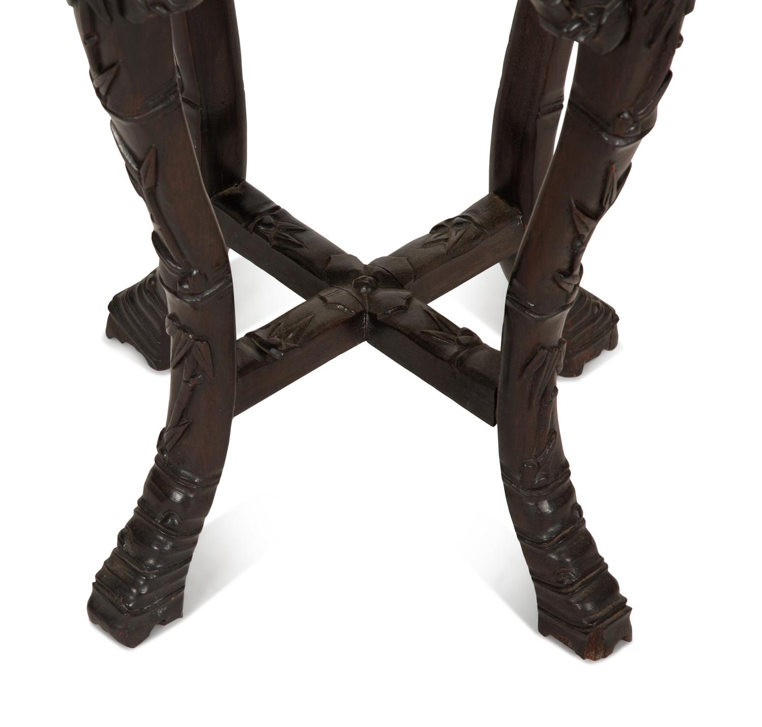 A Chinese Carved Hardwood Stand with Inset Marble Top