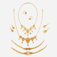 A collection of eight pieces of eighteen karat gold jewelry
