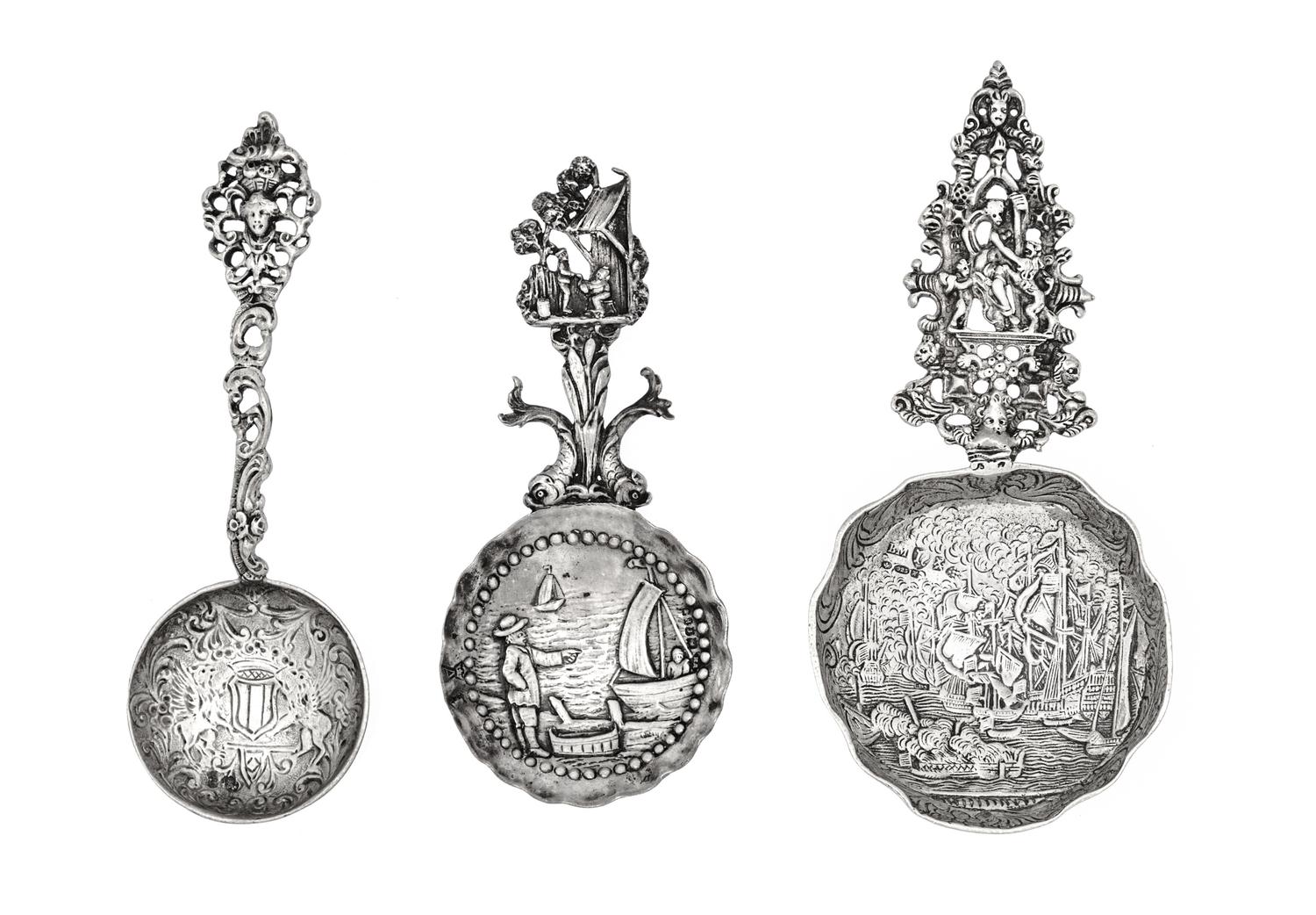 A Group of Three Continental Silver Serving Spoons, Various Makers, each having a decorated bowl and stem.