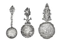 A Group of Three Continental Silver Serving Spoons, Various Makers, each having a decorated bowl and stem.