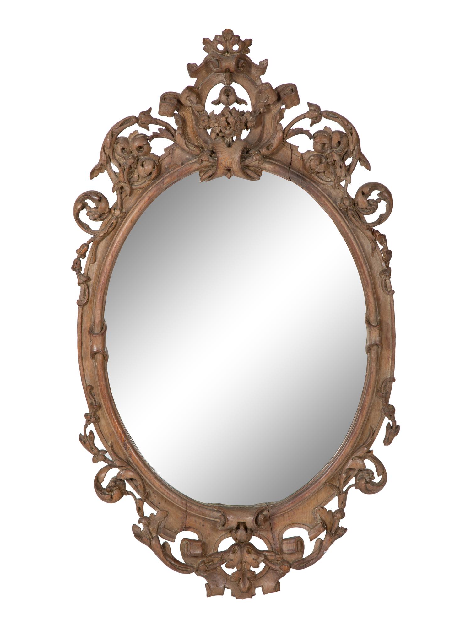 An Italian Baroque Style Carved Walnut Mirror