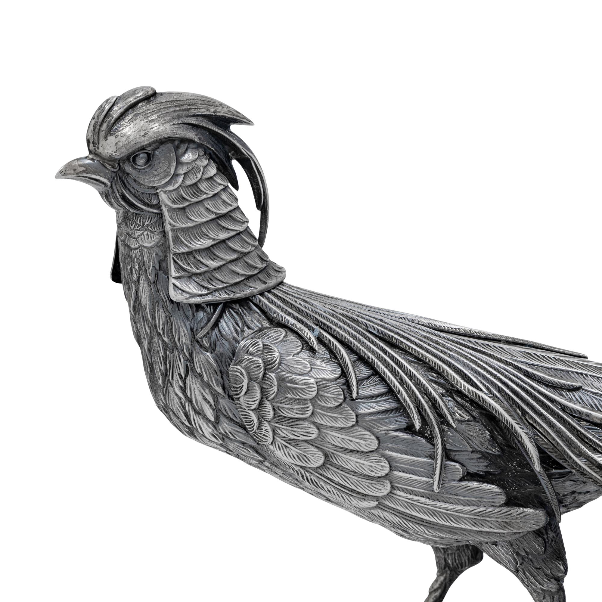 A Pair of Spanish Silver Pheasant Table Ornaments