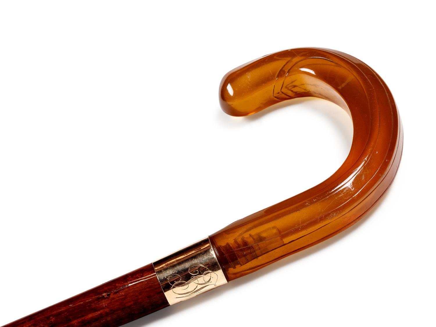A 14-Karat Gold Mounted Snakewood Walking Stick