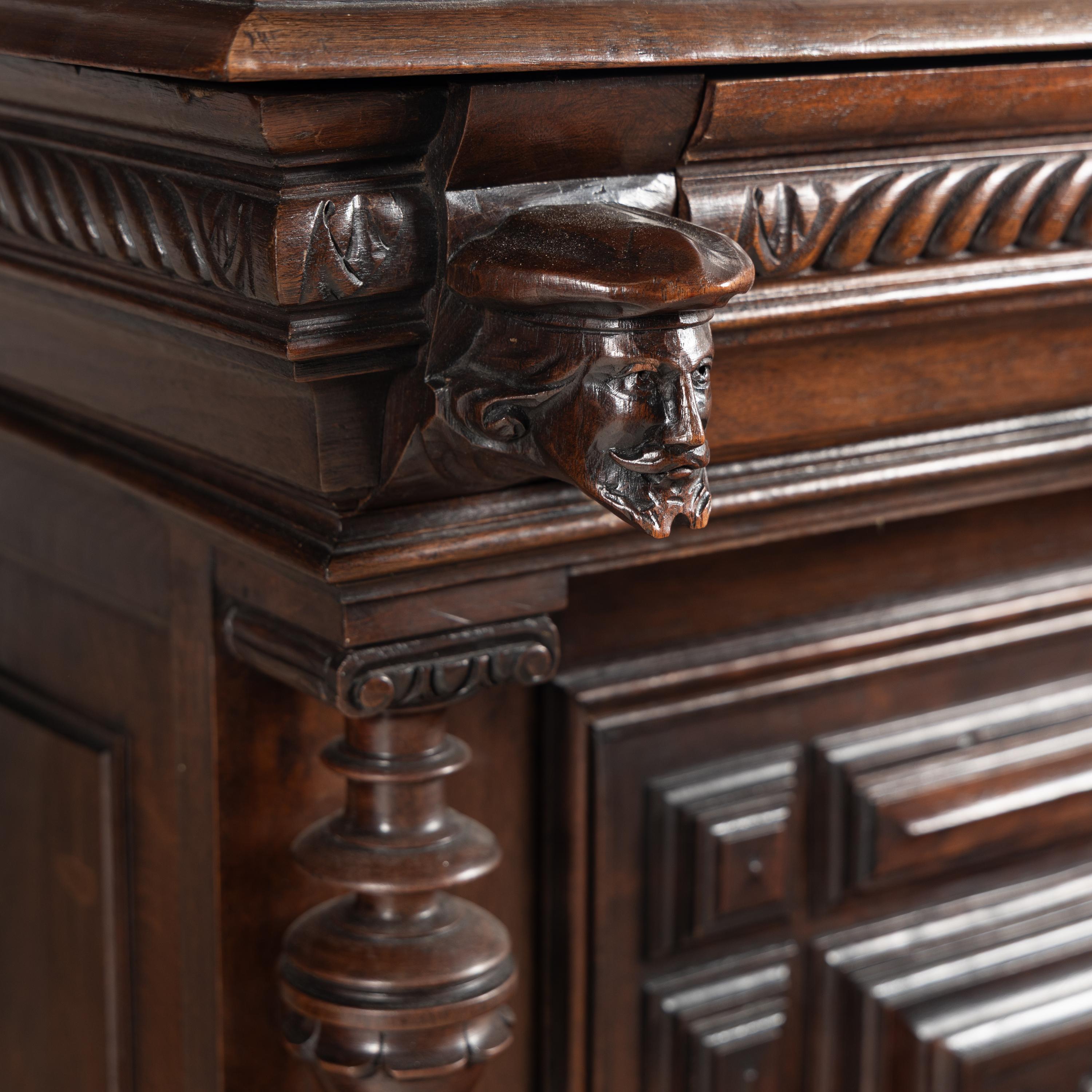 A Pair of French Renaissance Revival Walnut Serving Cabinets