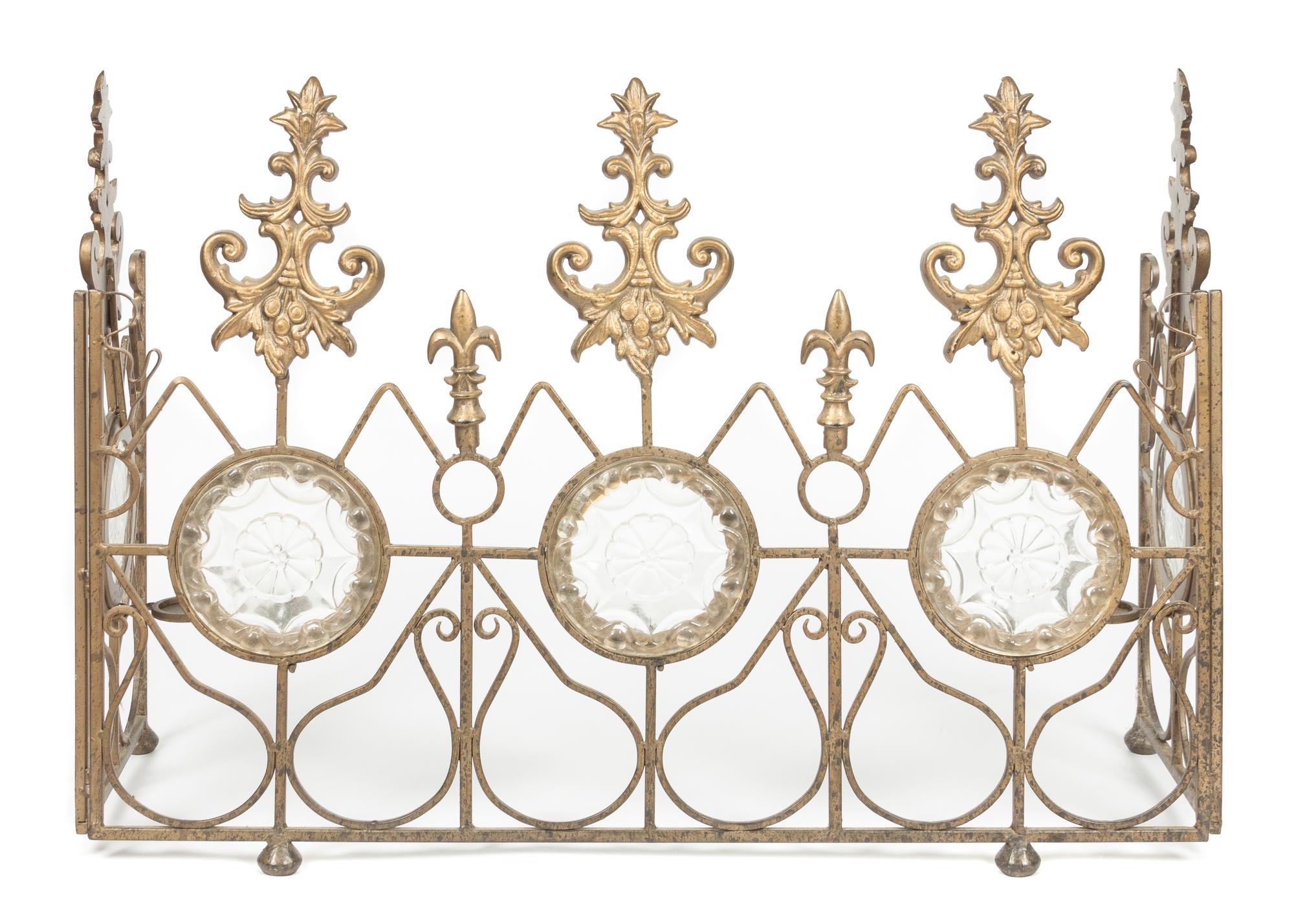 A Neoclassical Gilt Metal and Molded Glass Three-Panel Fire Screen Width of central panel 32 inches.