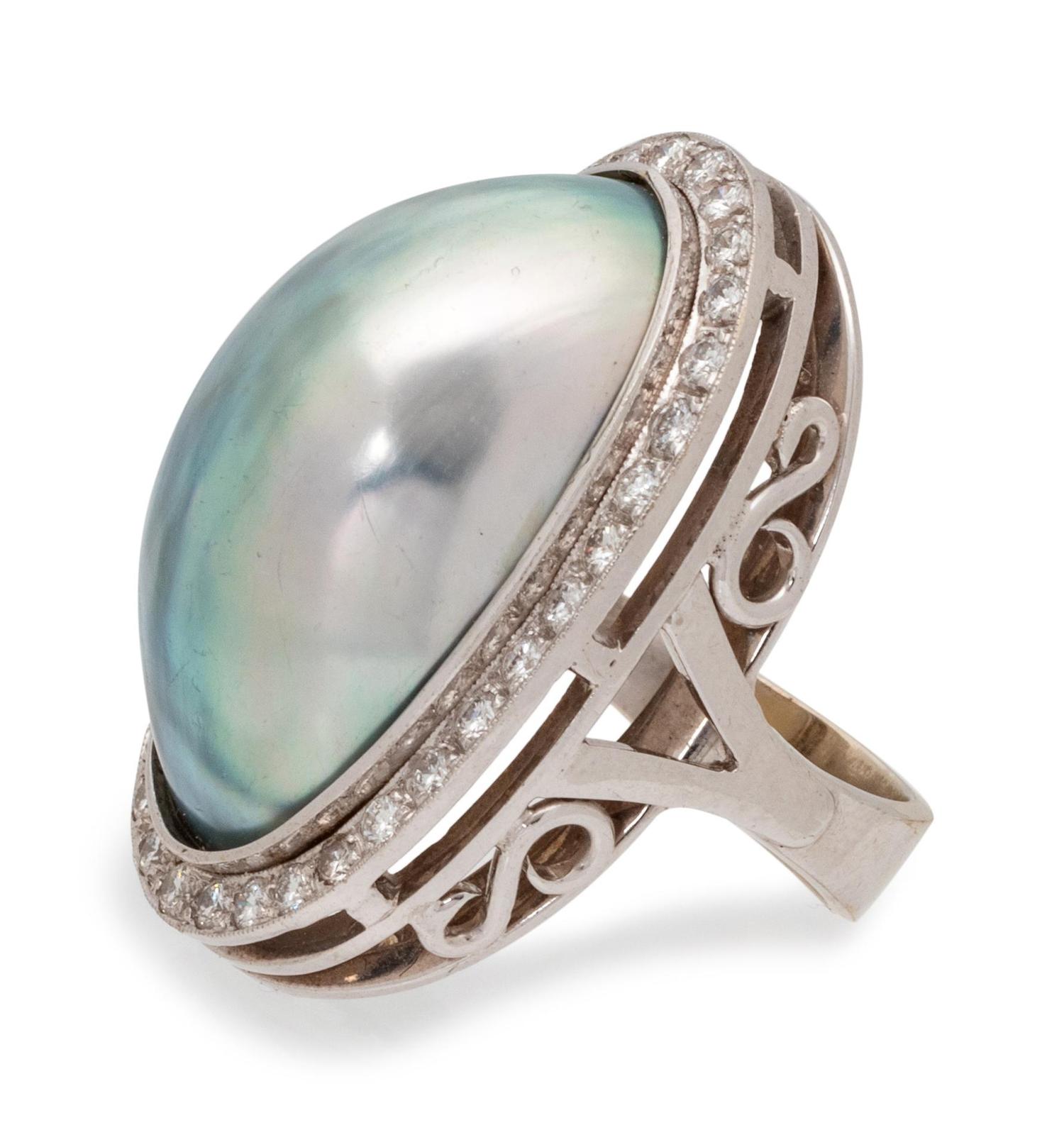 A 14 Karat White Gold, Cultured Mabe Pearl and Diamond Demi-Parure,