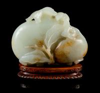 A Pale Celadon and Russet Jade Model of Pomegranates Height 3 inches. — 18TH/19TH CENTURY