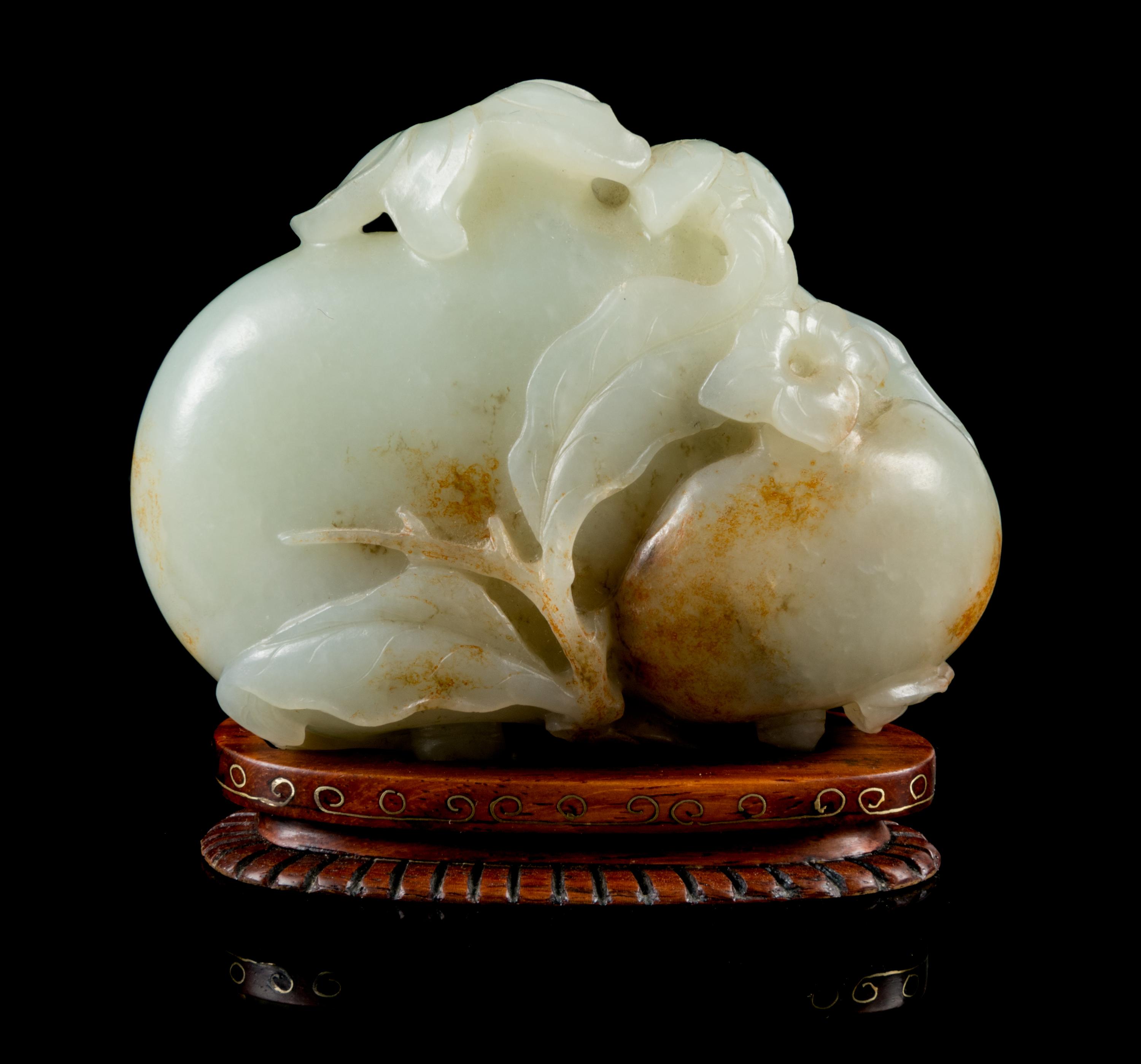 A Pale Celadon and Russet Jade Model of Pomegranates Height 3 inches. — 18TH/19TH CENTURY