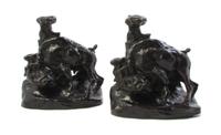 A Pair of American Bronze Bookends, CHARLES M. RUSSELL, Height 6 7/8 inches. — CHARLES M. RUSSELL,