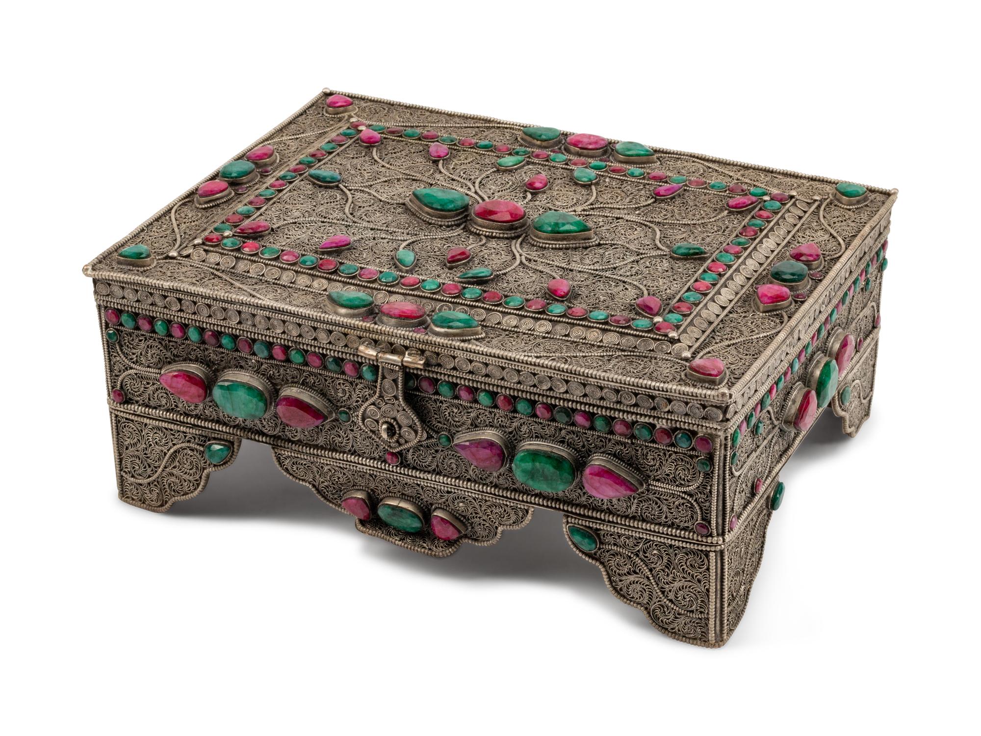 A Ruby and Emerald-Encrusted Silvered Metal Filigree Casket