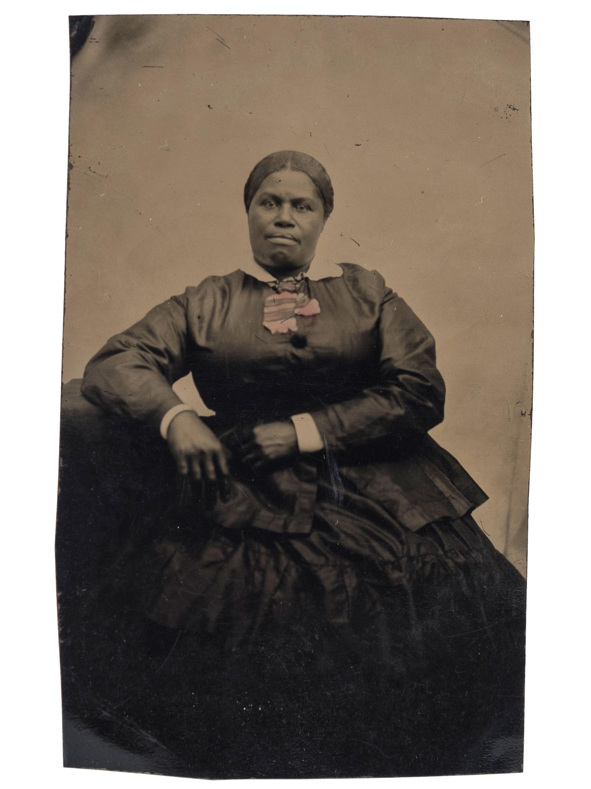 [EARLY PHOTOGRAPHY]. A group of 2 tintypes of African Americans, incl. female and male subjects.