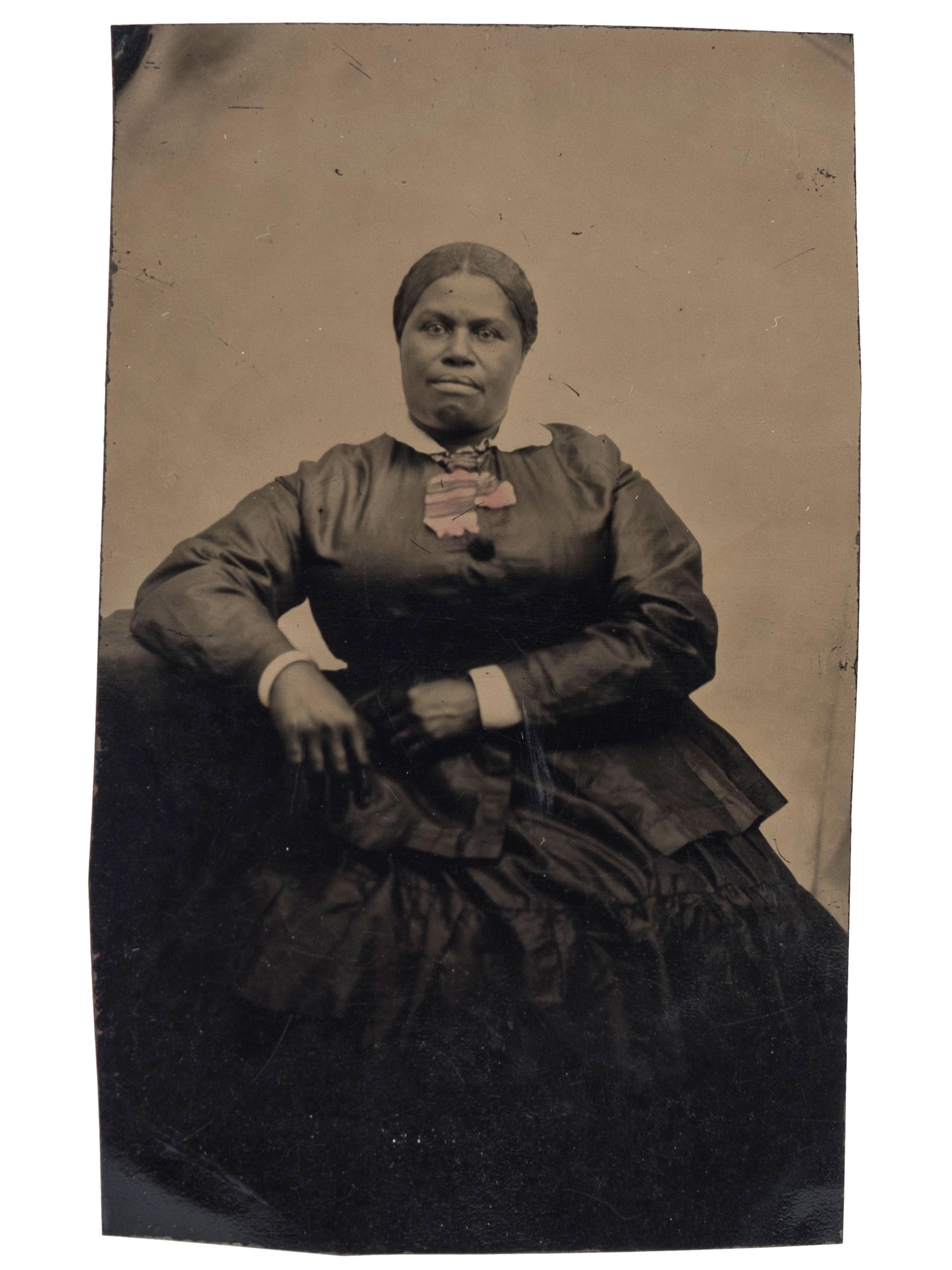 [EARLY PHOTOGRAPHY]. A group of 2 tintypes of African Americans, incl. female and male subjects.