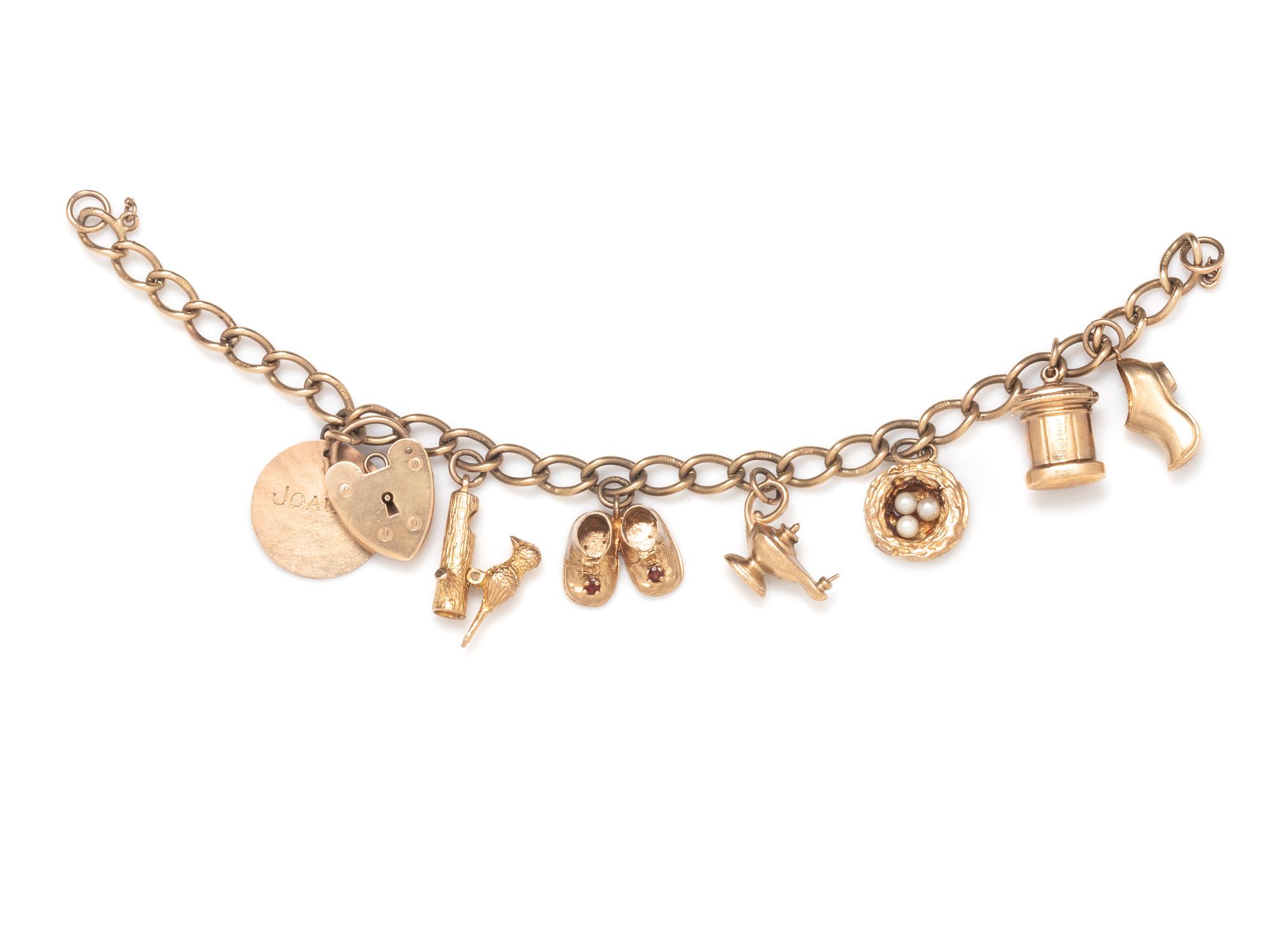 ENGLISH, LOW KARAT YELLOW GOLD CHARM BRACELET