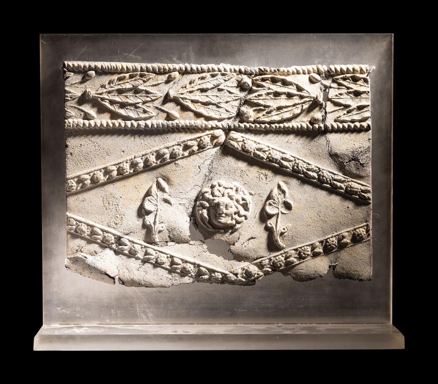 A Lead Sarcophagus Fragment