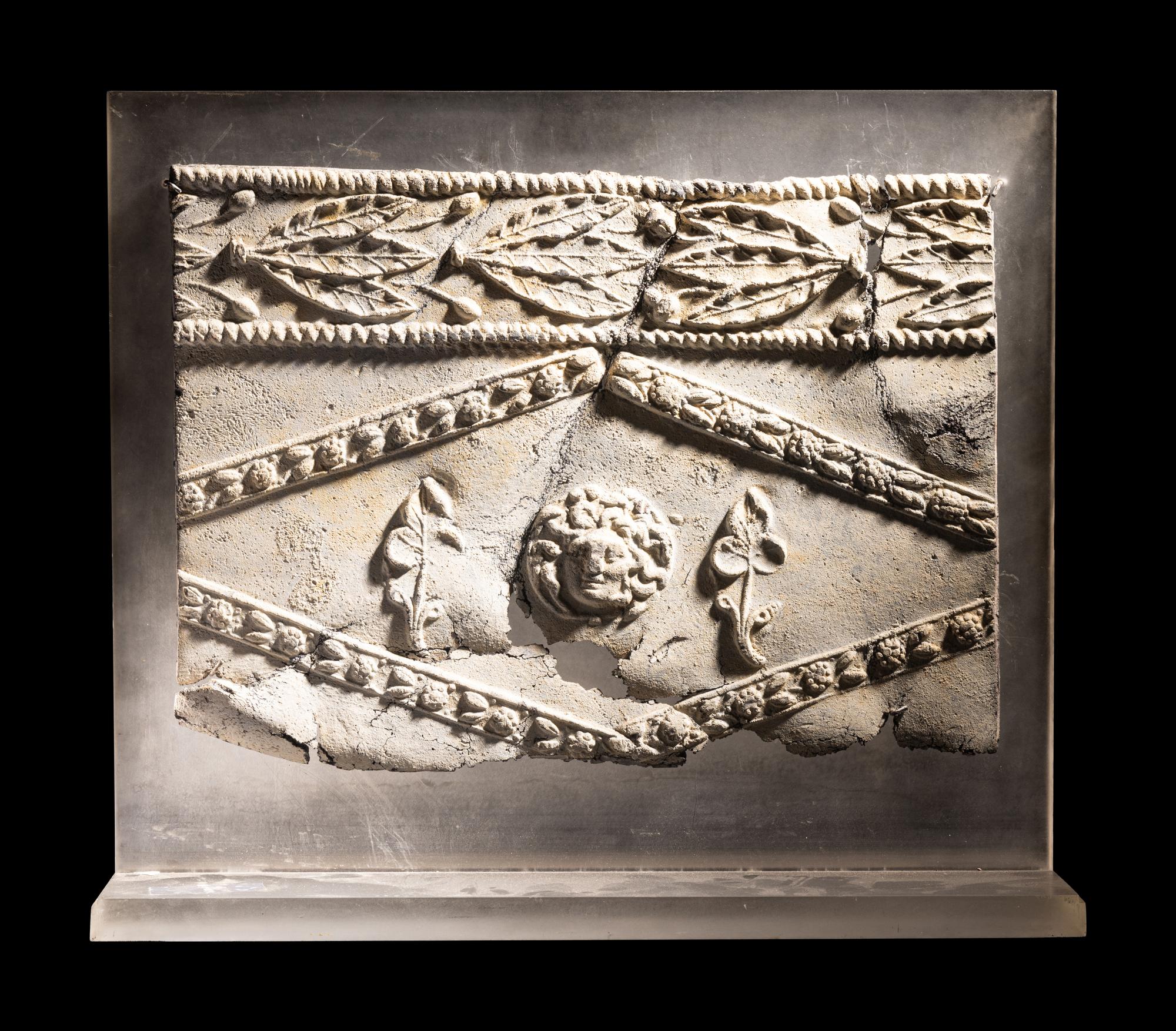 A Lead Sarcophagus Fragment
