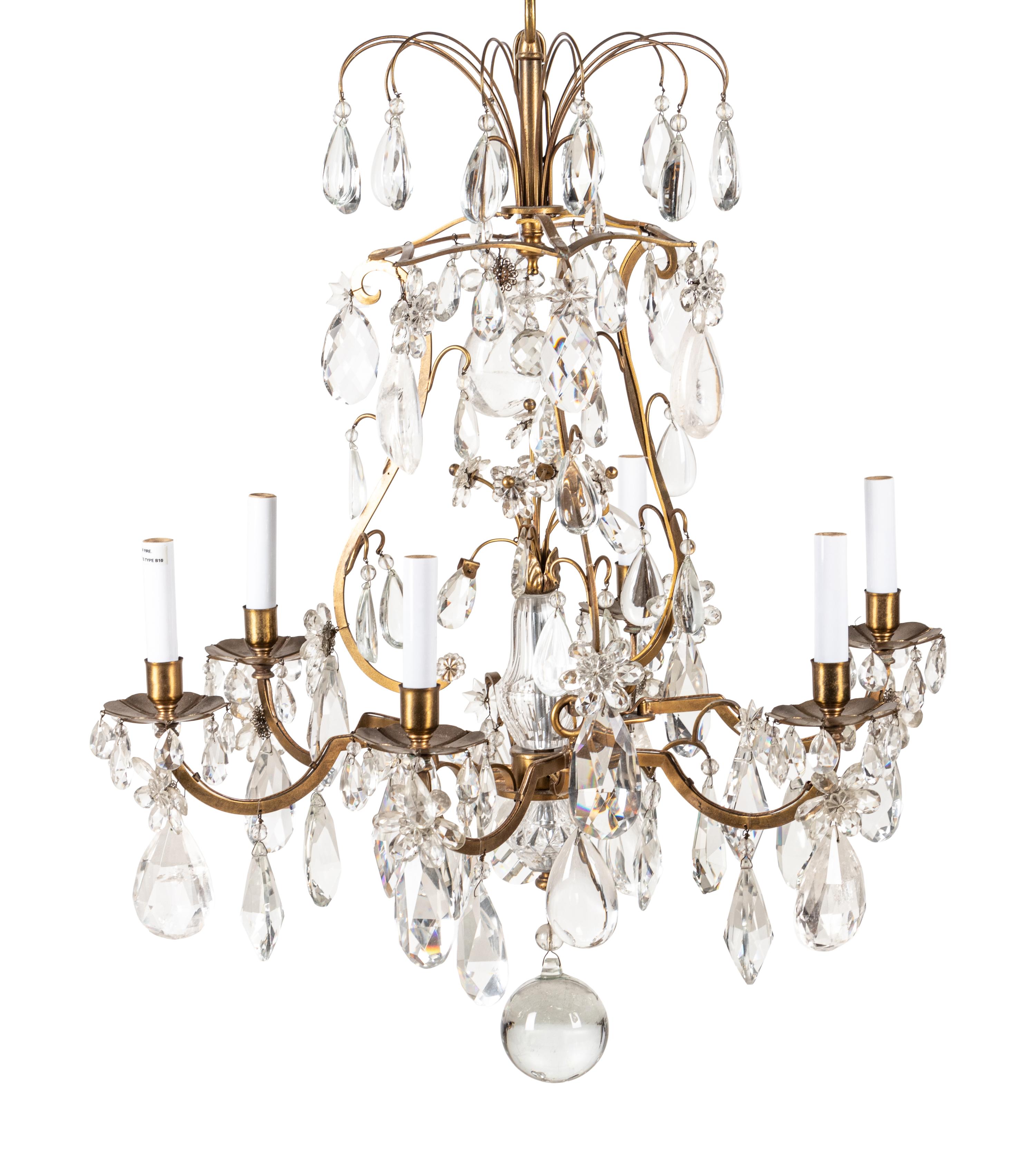 A French Gilt Bronze and Rock Crystal Six-Light Chandelier