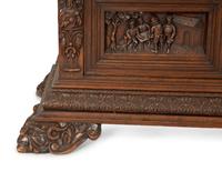 A German Black Forest Carved Oak Bookcase — Late 19th Century