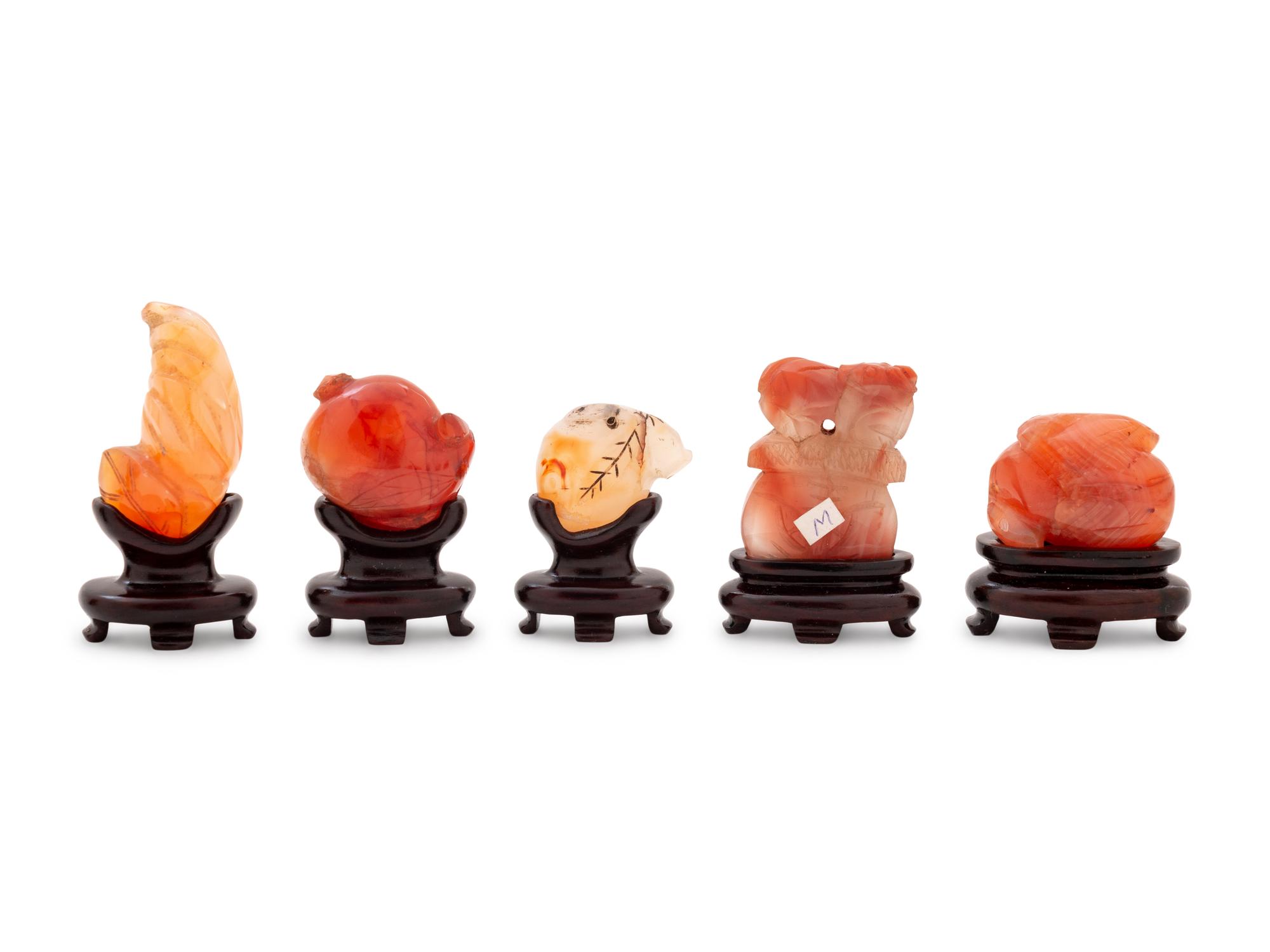 Seventeen Small Chinese Carnelian Agate Carvings