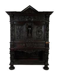 An Italian Baroque Style Carved Oak Cabinet on Stand — 18TH CENTURY