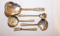 A Group of Five American Silver Flatware Servers, Stieff Co., Baltimore, MD and S. Kirk & Son, Baltimore, MD, with repousse decorated h