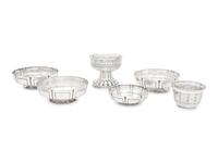 A Group of Six English Arts and Crafts Silver Table Articles