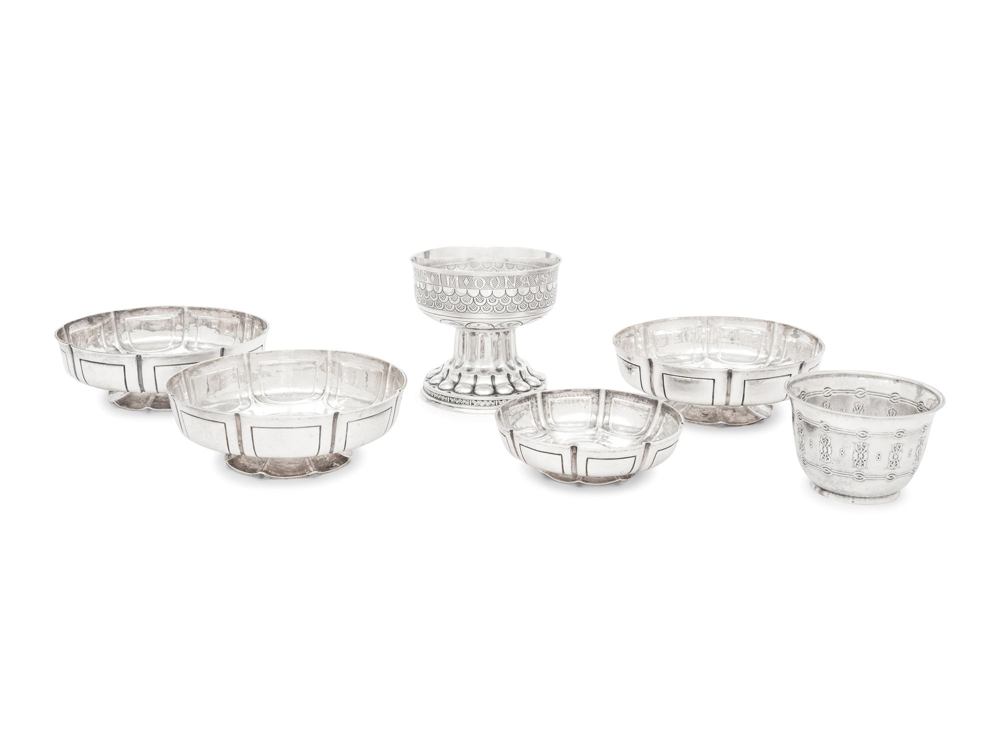 A Group of Six English Arts and Crafts Silver Table Articles