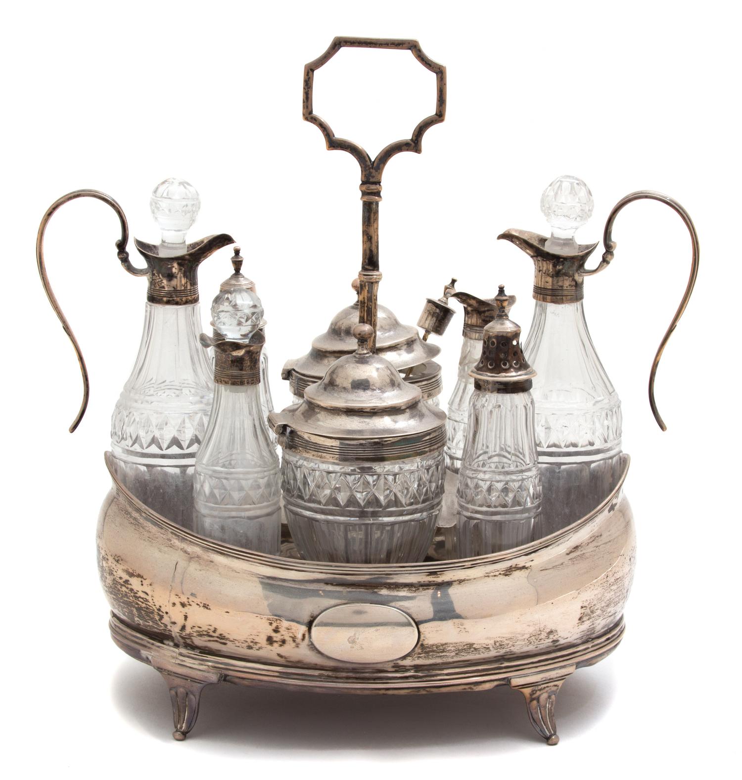 An English Silver and Cut Glass Cruet Set, London, 1805, having eight pieces