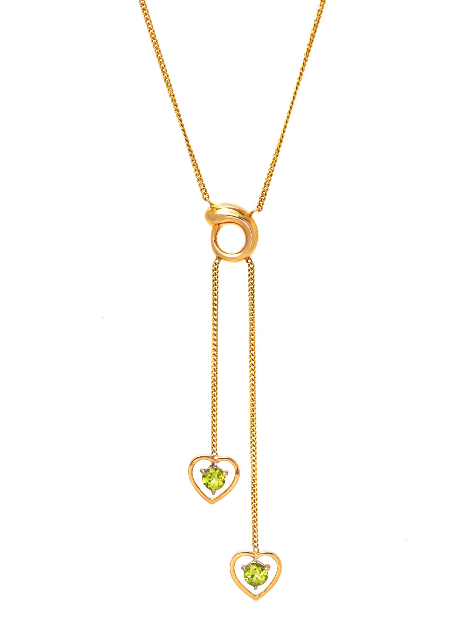 A 14 Karat Yellow Gold and Peridot Necklace,