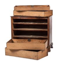 A George III Figured Mahogany Serpentine Front Bachelor's Chest