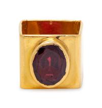An 18 Karat Yellow Gold and Garnet Ring, Cartier,