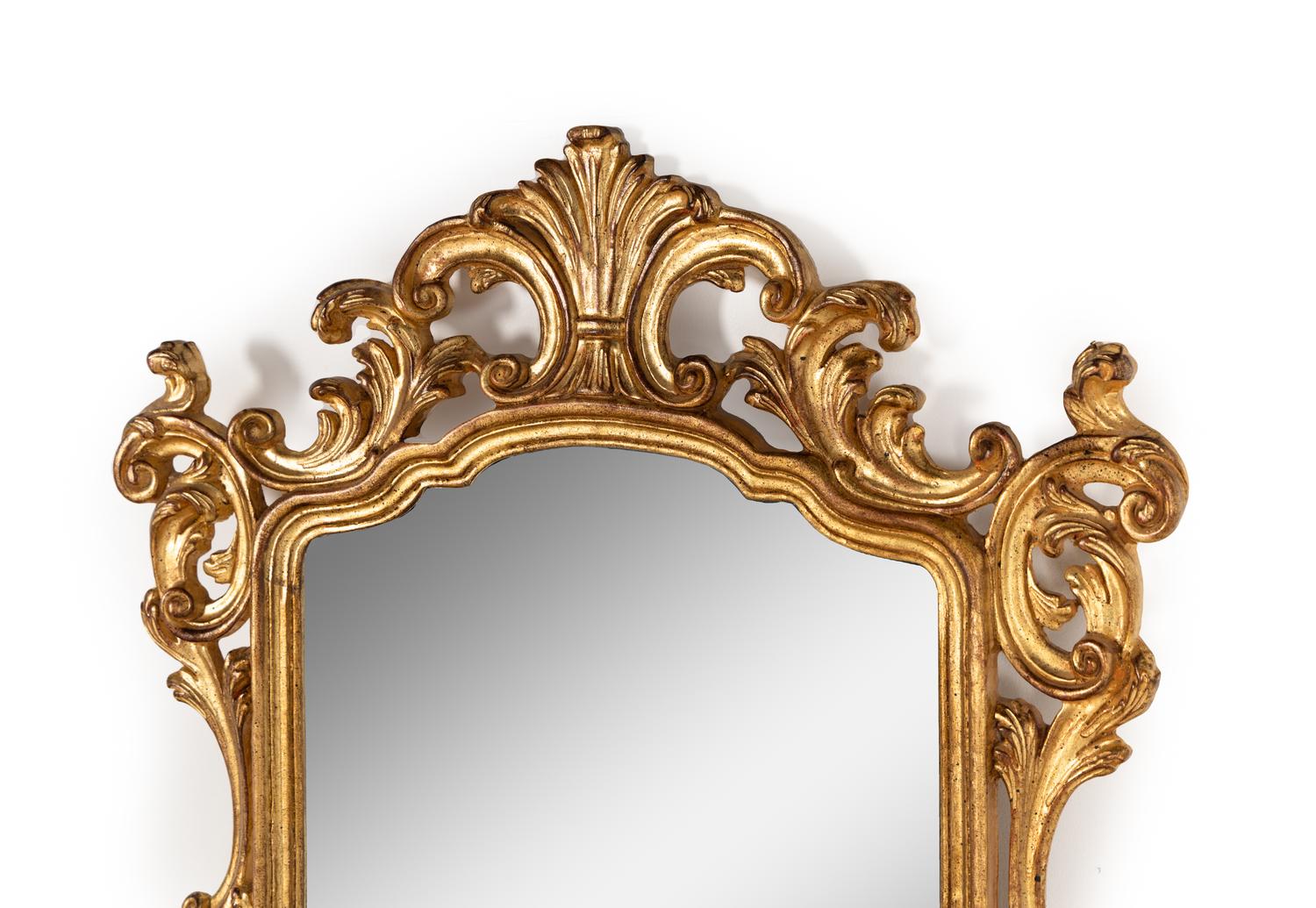 A Baroque Style Giltwood Mirror